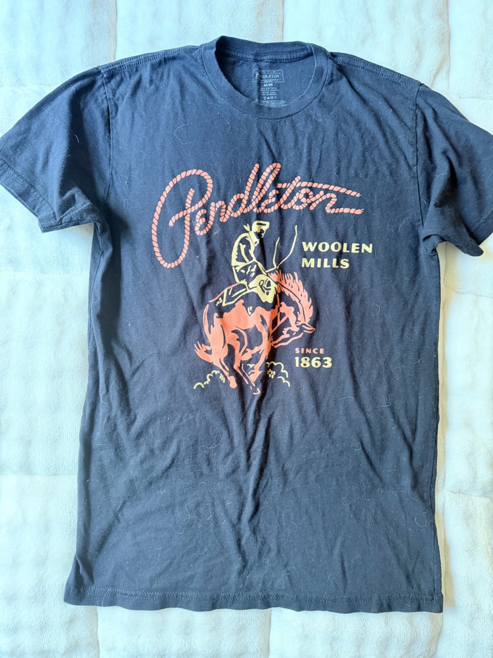 Black Graphic Rodeo Shirt with Orange and Yellow Print